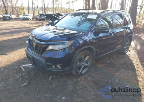 2021 Honda Passport 2Wd Touring from USA, damaged, VIN 5FNYF7H90MB006515